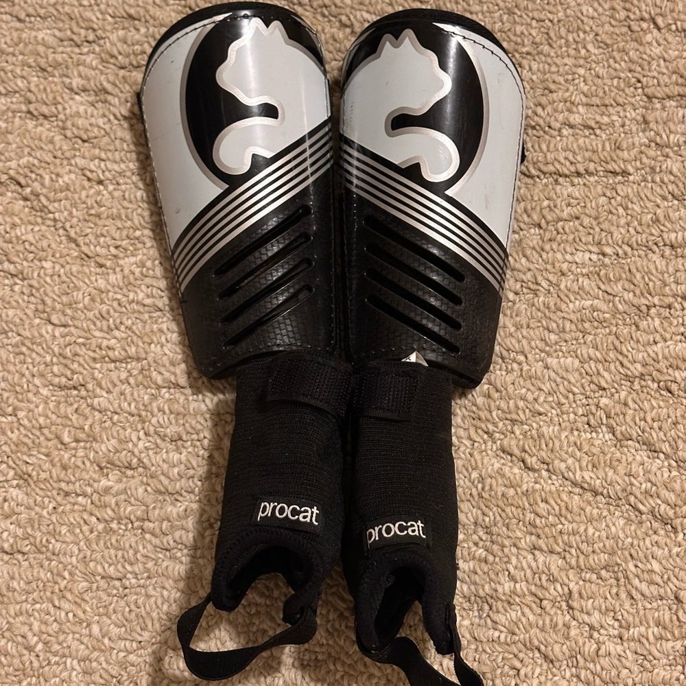 Puma Procat Black and Silver Shin Guards
